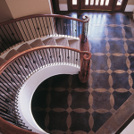 Kemiko Concrete Floor Photo Gallery - Spiral staircase leading to Kemiko concrete acid stained floor. Decorative Concrete Made Easy. Concrete Stain Ideas.