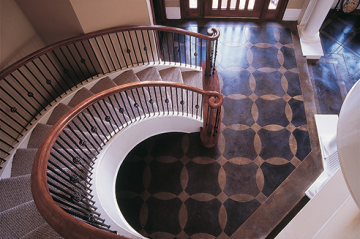 Kemiko Concrete Floor Photo Gallery - Spiral staircase leading to Kemiko concrete acid stained floor. Decorative Concrete Made Easy.