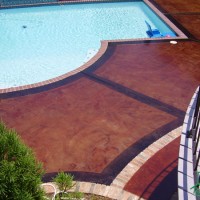 Kemiko decorative coatings on exterior, residential surface. Products: Kemiko Stone Tone Concrete Acid Stain in English Red and Black; Kemiko Single Component Sealer. Decorative Concrete Made Easy.