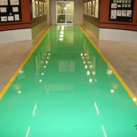 Kemiko Concrete Floor Photo Gallery - Kemiko industrial coatings on interior, commercial surface. Products: Kemiko Industrial Color Coat; Kemiko Industrial Top Coat. Decorative Concrete Made Easy.